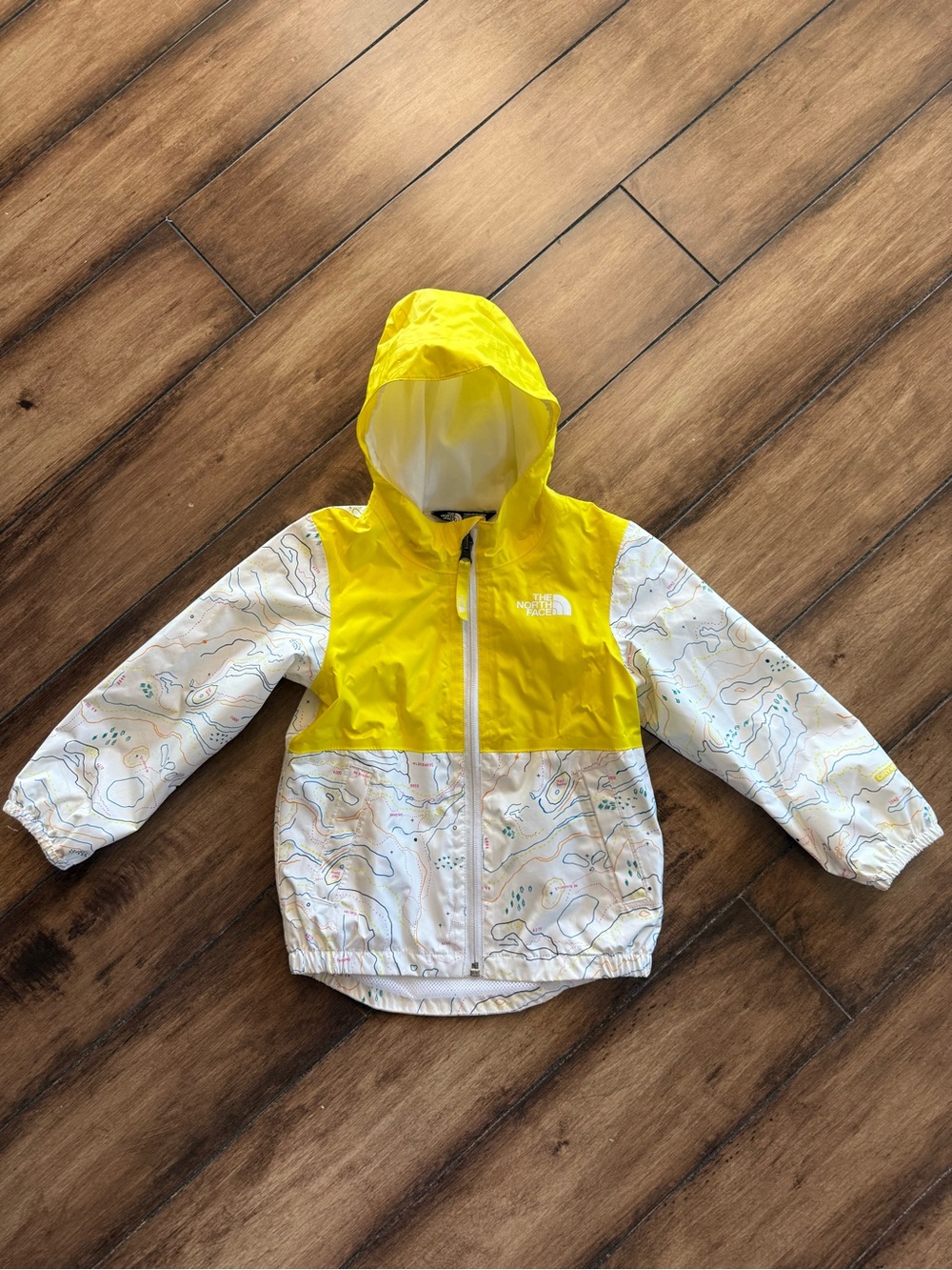 The North Face Zipline Rain Jacket in Yellow & White Trail map pattern
